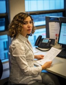 Mariami Lolashvili working at her desk